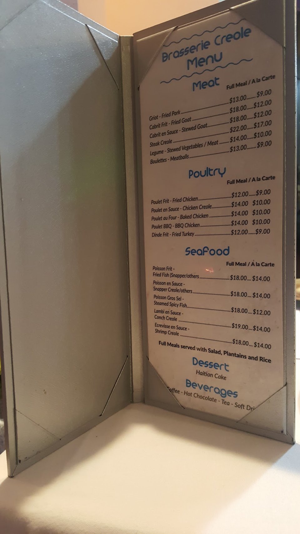 Menu page listing meat, poultry, and seafood
